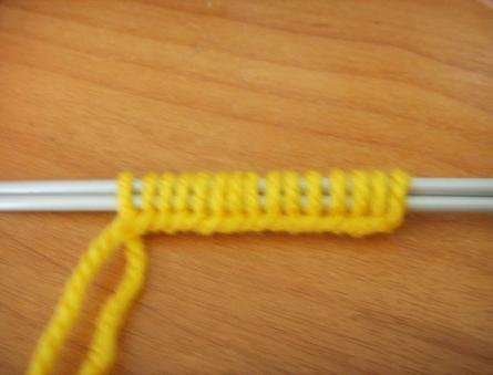 Learning to knit double elastic with knitting needles