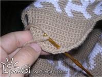Wie man eine Mütze für eine Frau strickt - Neuheiten Winterstrickmütze mit Revers